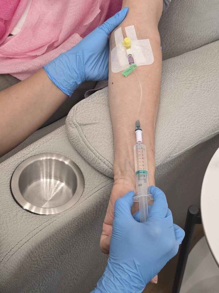 Syringe attached to line IV room